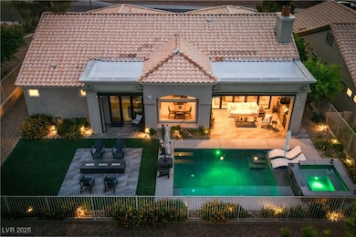 Back of house with outdoor lounge area, a patio, a