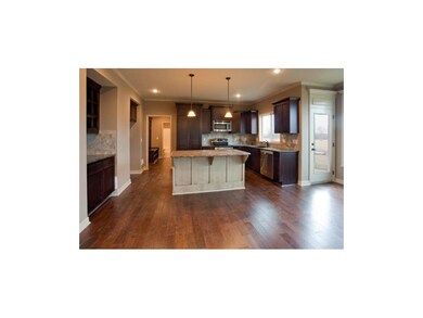 Kitchen includes: Granite counter tops, Delta oil 