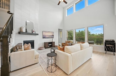 Living area featuring a towering ceiling, ceiling