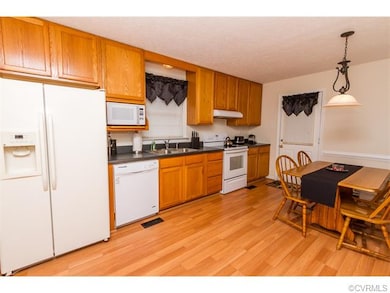 Alternate view of kitchen and eating area