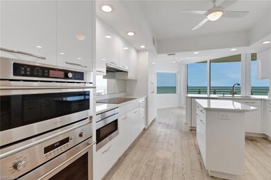 Kitchen SubZero side by side refrigerator/freeser and stainless steel Monogram appliances