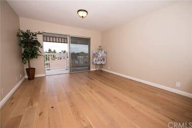 Spacious living room with sliding door to the balc