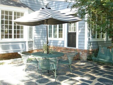 Spacious patio in fenced in back yard