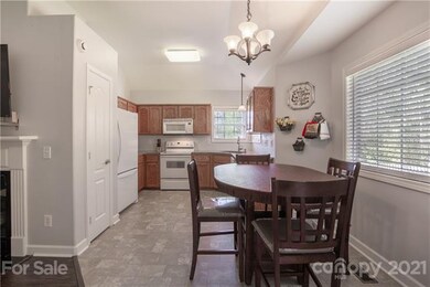 10 foot ceiling in dining area and kitchen.