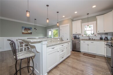 beautiful kitchen space with granite countertops,