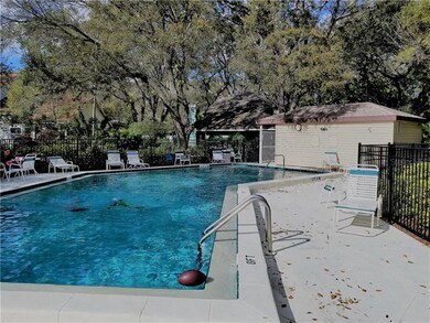 A few feet away is a tropical heated pool for your