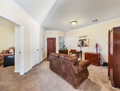Spacious front entrance can make a great home office or play area!