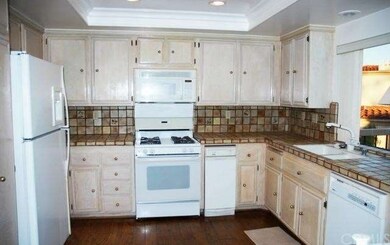The sunny Kitchen features an ample work area.