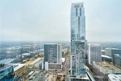 Property's view of city featuring a water view