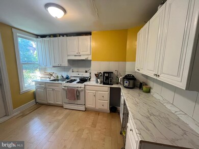 713 E 23rd St, Baltimore, MD 21218 - photo 5