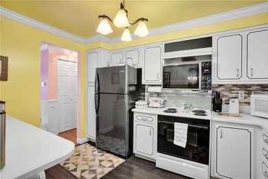 THERE'S A WALK IN HALL PANTRY FOR ADDED STORAGE.