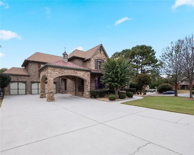 View of front facade with a garage and a front yar
