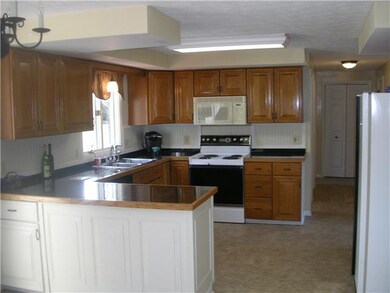 Exterior Front Kitchen has granite counters and oa