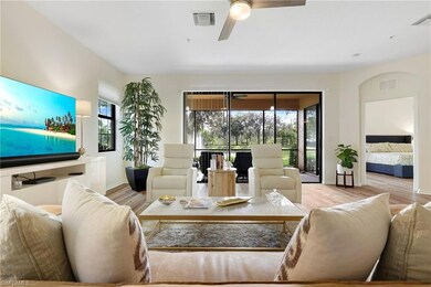 Living room with wood finished floors and baseboards