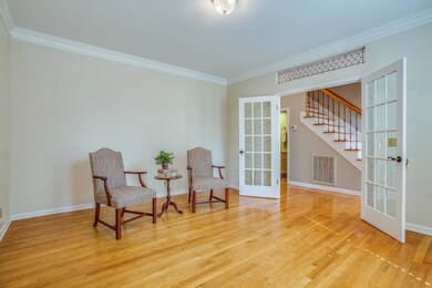 DESIGNATED OFFICE FEATURES:French doors ,transom is custom glass , Opens to foyer, Sand and seal hardwood floors , Crown molding , Plantation shutters, New paint 