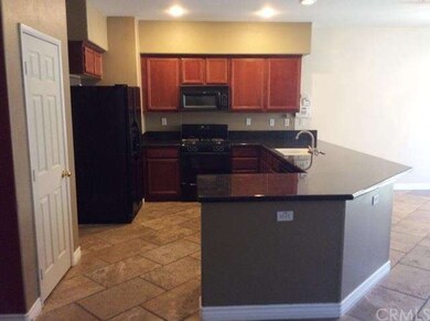 Kitchen with granite counter tops, pantry.