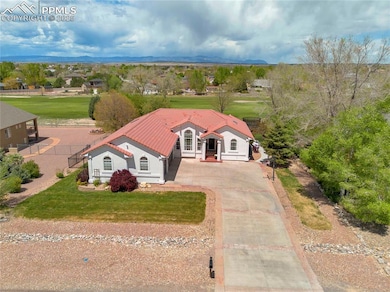 Aerial view of property and surrounding area with 
