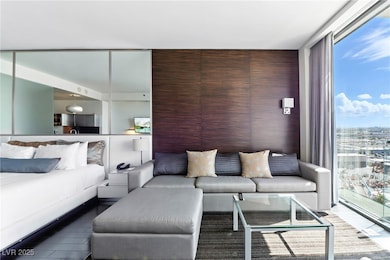 Living room featuring a wall of windows