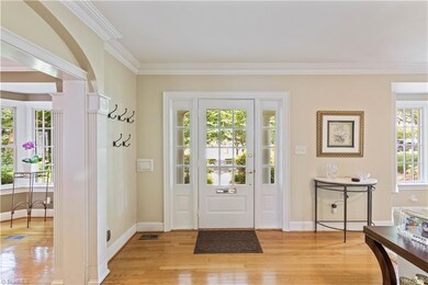 Step onto the welcoming porch and into a home with gleaming hardwoods throughout all levels.