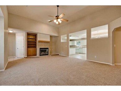 Living Room. Great area around cozy fireplace with built-in and room for TV/media.