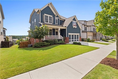 Craftsman house featuring driveway, a garage, covered porch, and brick siding