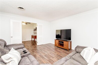 Living room open to dining room