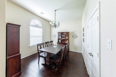 This formal dining room is based on more rich laminate flooring and has room enough for large dinner parties. Featuring direct access to the kitchen for your serving convenience! A large scenic window brings in natural light.