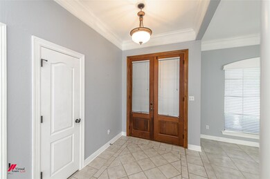Gorgeous entry into large and open formal dining r