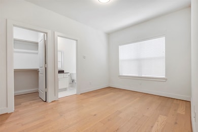 One of the two secondary bedroom on the 1st floor