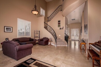 Living Room and dramatic iron staircase