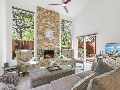 Living room featuring high vaulted ceiling, ceili