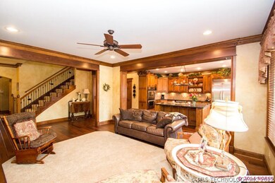 Large family room with custom bookcases and floor