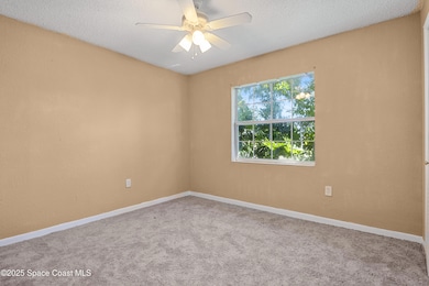 697 Castaways St NE, Palm Bay, FL 32907 - photo 7
