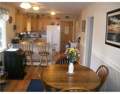 Exterior Front. Kitchen and dining area