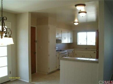 Viewing kitchen from dining area.