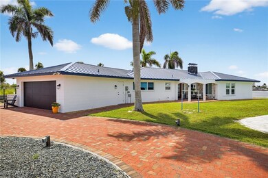 View of front of property with a standing seam roo