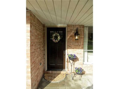 Exterior Front. Enter this lovely brick home and e