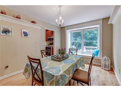 Formal Dining Room With Charming Wooden Shelves