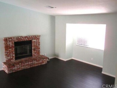 NEW Wood Flooring in Common Areas, Cozy Brick Fire