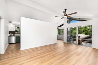 Living Room w/ Vaulted Ceiling
