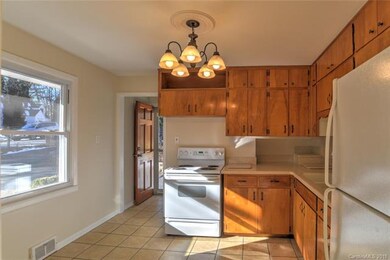 Your sun-filled kitchen with easy access to your c