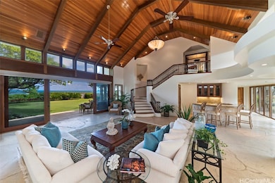 Custom sliding doors frame the gorgeous ocean view