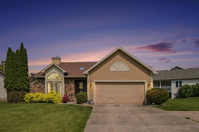 6606 Windsong Way, Lansing, MI 48917 - photo 2