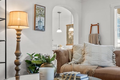 Living Room with Arched Doorways
