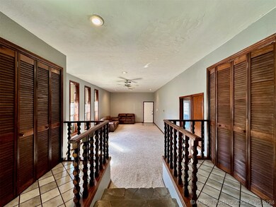 ENTRYWAY FOYER FEATURES A COAT CLOSET AND A SEWING