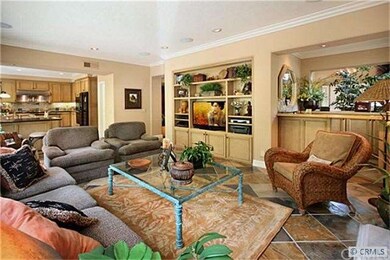 Warm and cozy family room with fireplace, surround