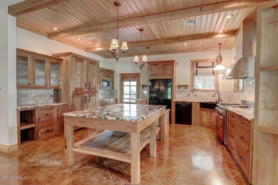 1230 Chemin Agreable Rd, Youngsville, LA 70592 - photo 4