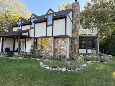 7036 Woodlea Rd W, Oscoda, MI 48750 - photo 2