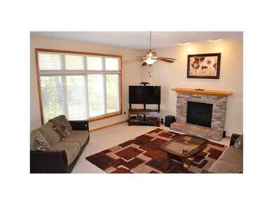 Great Room. Fireplace with brick surround
