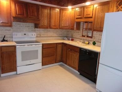 Lots of cabinets in this kitchen.